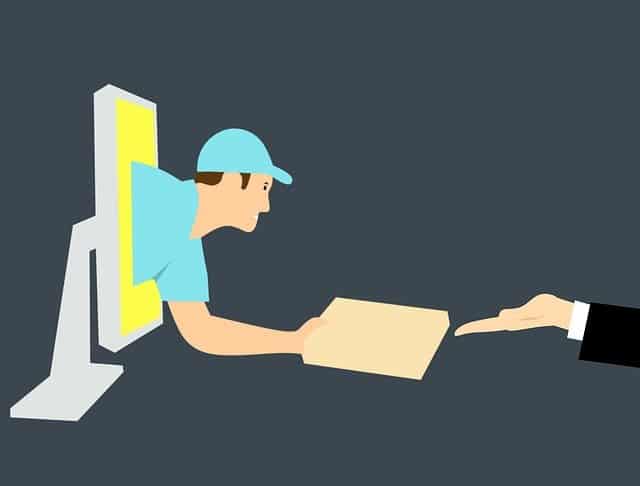 cartoon delivery man coming out of monitor handing package