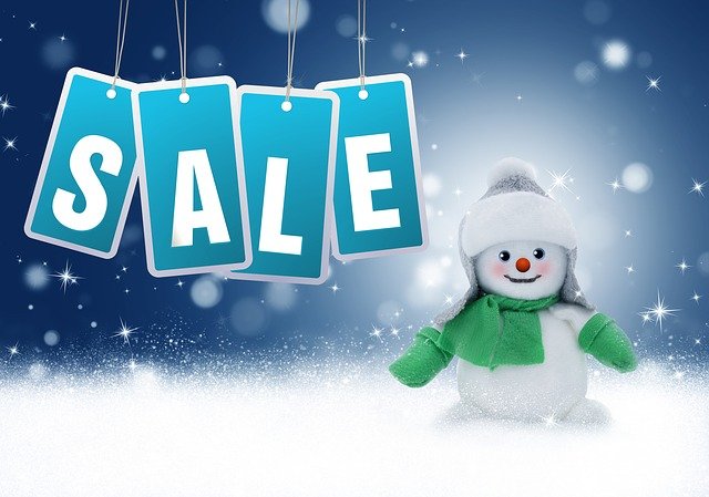 Blue-sale-tags-hanging-next-to-snowman